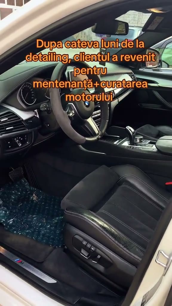 BMW X6 alb revenit la atelier pentru mentenanță periodică